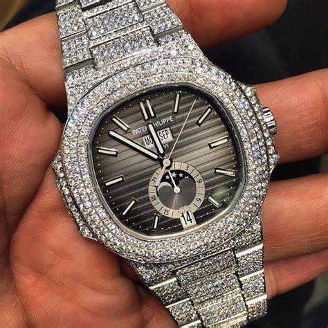 replica gold patek philippe nautilus iced out